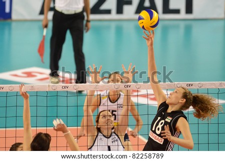 DEBRECEN, HUNGARY - JULY 9: Julia Milovits (in black 18) in action a CEV European League woman\'s volleyball game Hungary (black) vs Israel (white) on July 9, 2011 in Debrecen, Hungary.