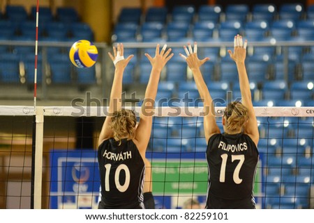 DEBRECEN, HUNGARY - JULY 9: Anita Filipovics (in black 17) in action a CEV European League woman's volleyball game Hungary (black) vs Israel (white) on July 9, 2011 in Debrecen, Hungary.