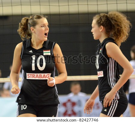 DEBRECEN, HUNGARY - JULY 9: Dora Horvath (in black 10) in action a CEV European League woman\'s volleyball game Hungary (black) vs Israel (white) on July 9, 2011 in Debrecen, Hungary.