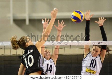 DEBRECEN, HUNGARY - JULY 9: Dora Horvath (in black 10) in action a CEV European League woman\'s volleyball game Hungary (black) vs Israel (white) on July 9, 2011 in Debrecen, Hungary.