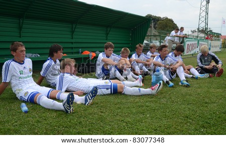 NAGYBERKI, HUNGARY - JULY 18: Ukrainian players listen to their trainer at the VII. Youth Football Festival Under 14 match Kiev (UKR) vs. Brescia Academy (ITA) July 18, 2011 in Nagyberki, Hungary