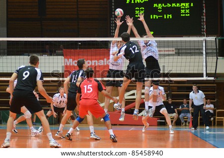 KAPOSVAR HUNGARY SEPTEMBER 21 Unidentified players in action at a Hungarian National Championship volleyball game Kaposvar white vs Kecskemet black September 21 2011 in Kaposvar Hungary KAPOSVAR HUNGARY SEPTEMBER 21 Unidentified players in action at a Hungarian National Championship volleyball game Kaposvar white vs Kecskemet black September 21 2011 in Kaposvar Hungary