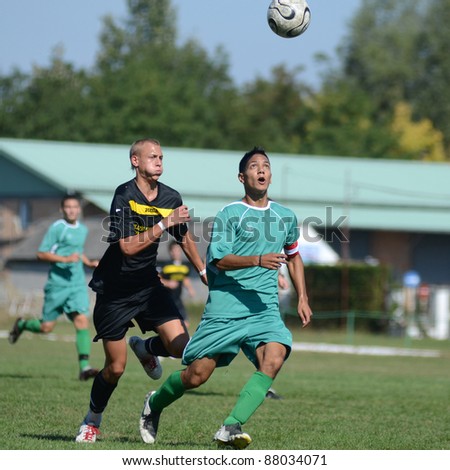 KAPOSVAR, HUNGARY - OCTOBER 2: Unidentified players in action at the Hungarian National Championship under 17 game between Kaposvar (green) and Nagykanizsa (black) October 2, 2010 in Kaposvar, Hungary
