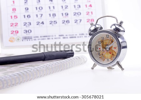 Open the calendar, alarm clock and a laptop