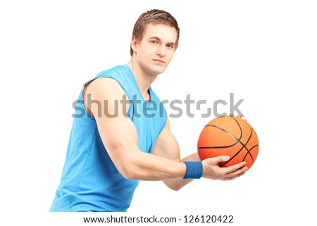A male basketball player with basketball looking at camera isolated on white background