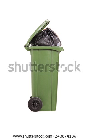 Studio shot of a trash can full of garbage isolated on white background