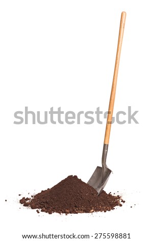 Vertical studio shot of a shovel stuck in a pile of dirt isolated on white background