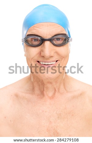Close-up on a senior man with a blue swimming cap and black swim goggles isolated on white background