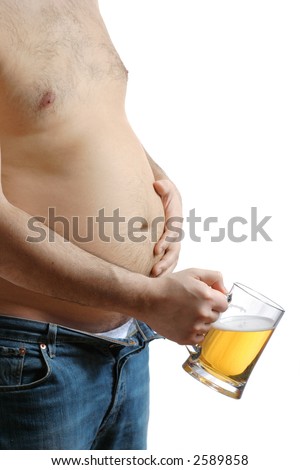 beer belly men. man holding his eer belly