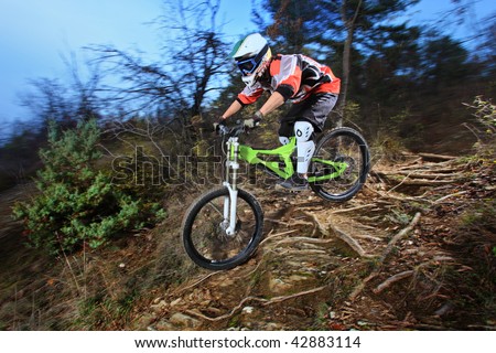 Downhill Mountain Bikes on Young Man Riding A Mountain Bike Downhill Style Stock Photo 42883114