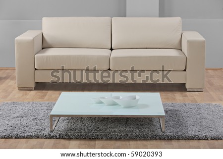 A studio shot of a white leather furniture