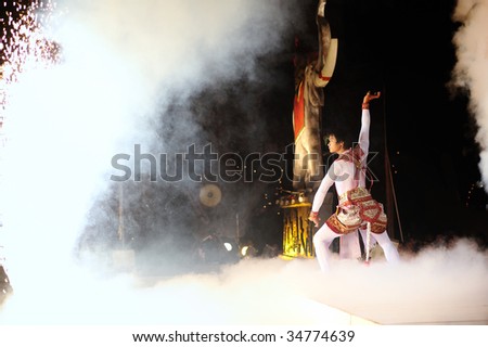 BANGKOK , THAILAND - AUG 1: A participant entertains spectators at the 1st Asian martial arts games 2009, opening ceremony at Indoor Stadium Huamark on August 1, 2009 in Bangkok, Thailand.