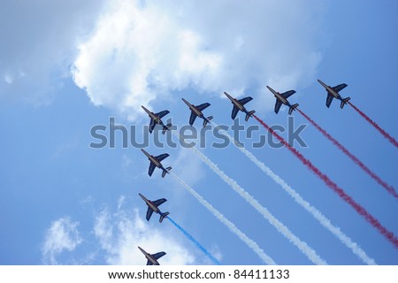 PARIS, FRANCE - JUL 14: Patrouille de France in the sky for the national day parade  on July 14, 2011 in Paris, France.