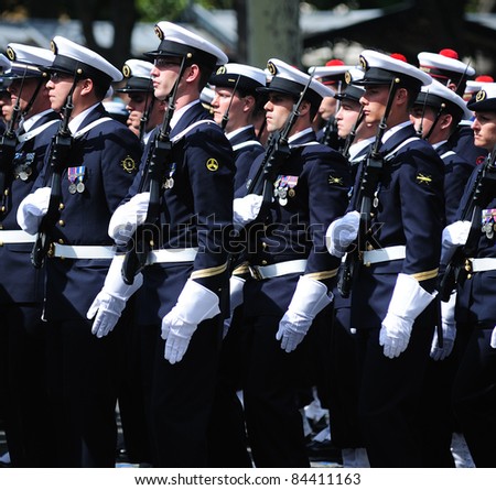 PARIS, FRANCE - JULY 14: Student of the French navy school in dress uniform at the national day parade July 14, 2011 in Paris, France