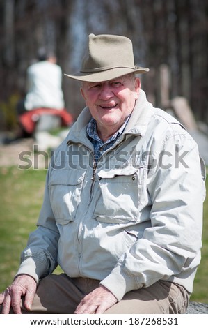 Elderly people outside in the nature sitting