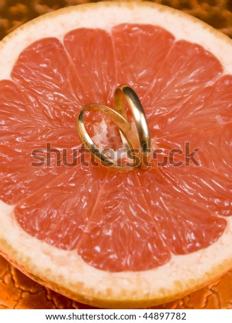 Fruit and two rings