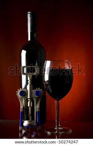 Red wine, bottle and bottle-opener