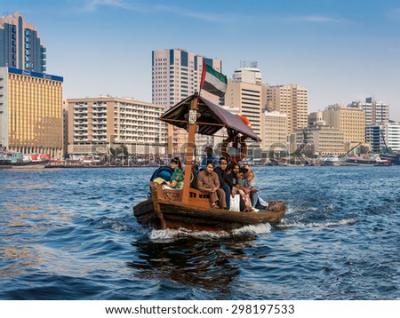 DUBAI, UNITED ARAB EMIRATES (UAE): People crossing the Creek from Deira to Bur by abra, a traditional wooden water taxi in Dubai, United Arab Emirates