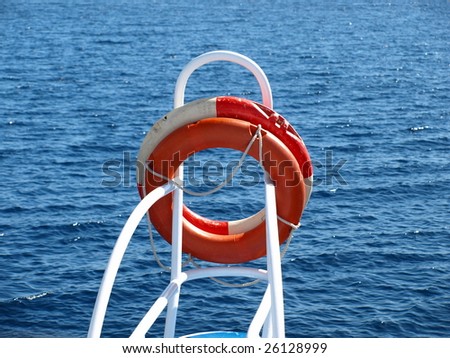 Orange safe guard ring against sea background