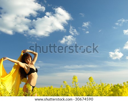 happy woman with scarf in yellow