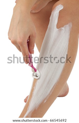 stock photo A young girl shaves her legs