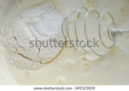 Cooking buttery cream on kitchen,horizontal photo