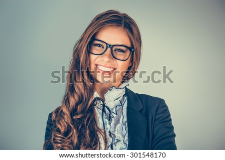 Closeup portrait head shot sexy beautiful happy young woman with glasses smiling isolated on grey green background wall. Positive human emotions face expression feeling life perception Success concept