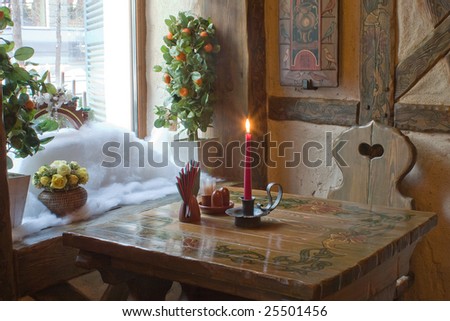 Elegant restaurant - table, candle, christmas decoration.