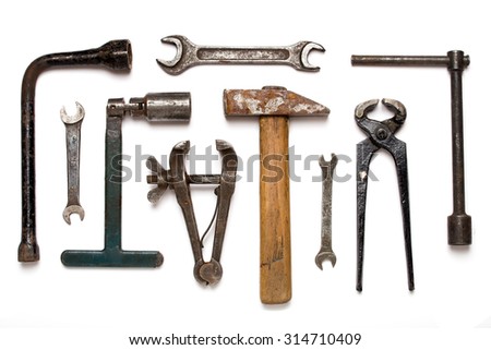 Old rusty mechanic tools isolated on white