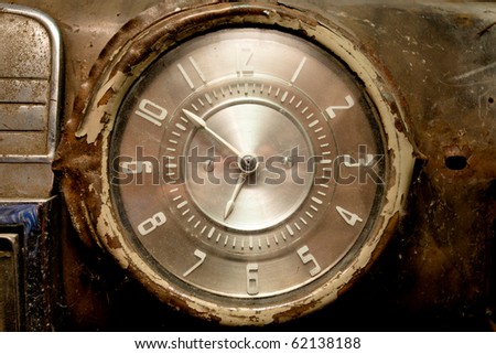 stock photo Old car dashboard clock pointing ten to seven