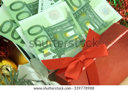 Christmas and New Year  is  time to spend money\
gift with money \
one hundred Euro bank