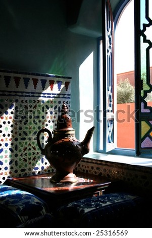 tea-can in a window at marrakesh morocco