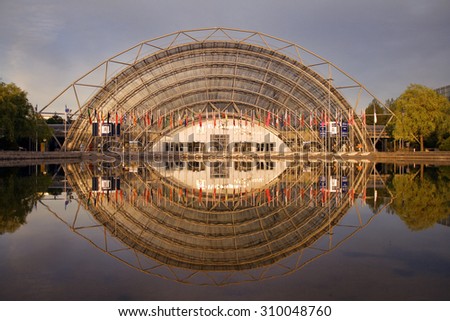 Leipzig, Germany - May 22, 2014: Sunset at Messe, Leipzig Trade Fair. The new Leipzig Trade Fair was built in 1995 and opened in April 1996. The Glass Hall was designed by Ian Ritchie Architects.