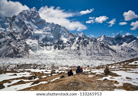 Trekkers going to see Mt. Everest up close attempt to climb to the top of Kala Patthar in Sagarmatha National park, Nepal