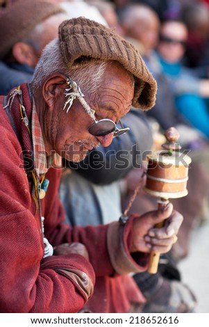 LAMAYURU, INDIA - JUNE 17: An unidentified Tibetan nomad in national clothes poses for a photo during Yuru Kabgyat festival at Lamayuru Gompa on June 17, 2012 in Lamayuru, North India