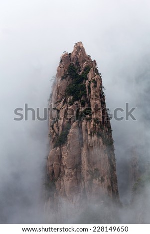 Misty morning in Huangshan Mountain (Yellow Mountain), China. Of all the notable mountains in China, it is probably the most famous to be found in the south of Anhui province.