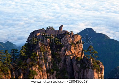 View point \'Stone monkey gazing over sea of clouds\' in Huangshan mountain, China. Of all the notable mountains in China, it is probably the most famous to be found in the south of Anhui province.