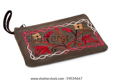 stock photo : The cosmetic bag with hand-made embroidery isolated on the 