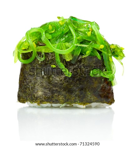 Japanese fresh maki sushi with green seaweed