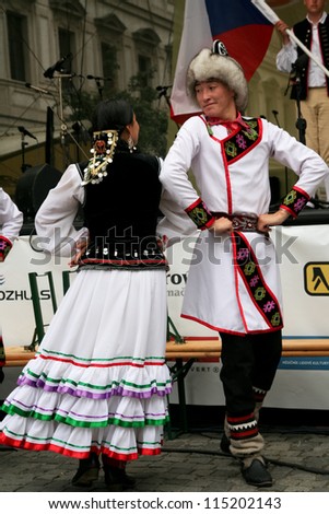 PRAGUE - AUGUST 26: Unknown people dance in traditional costumes at Folklore Festival Prague Fair, 25-30.8.2009, close to the Old Town Square on August 26, 2009 in Prague, Czech Republic