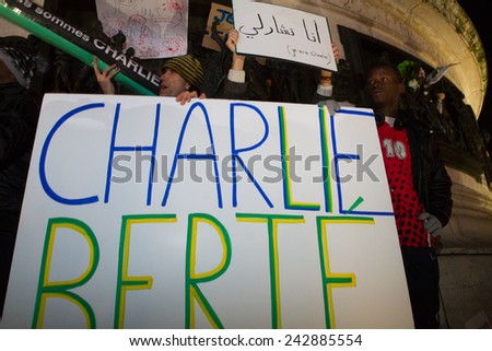 PARIS - JANUARY 8: Peaceful protest in Place de la Republique against the terrorist attack on Charlie Hebdo journal and supporting the freedom of press, Paris, France on 08 January 2015