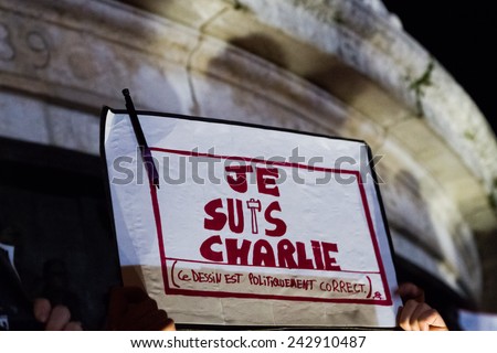 PARIS - JANUARY 8: Peaceful protest in Place de la Republique against the terrorist attack on Charlie Hebdo journal, promoting freedom of speech in Paris, France on 08 January 2015