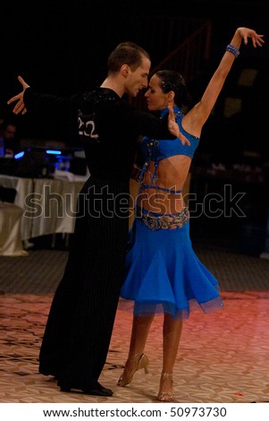 BUCHAREST - MARCH 14: Latin dancers at IDSF Dance Masters on March 14, 2010 in Bucharest, Romania.