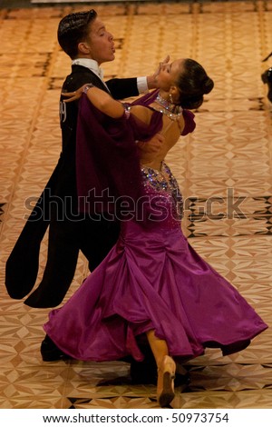 BUCHAREST - MARCH 14: Ballroom dancers at IDSF Dance Masters on March 14, 2010 in Bucharest, Romania.