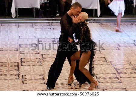 BUCHAREST - MARCH 14: Dance couple at IDSF Dance Masters on March 14, 2010 in Bucharest, Romania.