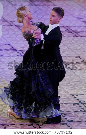 BUCHAREST - APRIL 17: Unknown ballroom dancers, competing at IDSF (International DanceSport Federation) Dance Masters on April 17, 2011 in Bucharest, Romania
