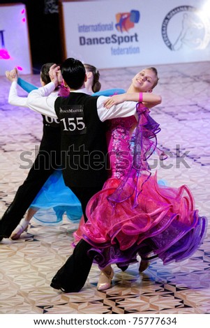 BUCHAREST - APRIL 17: Unknown latin dancers, compete at IDSF (International Dance Sport Federation) Dance Masters on April 17, 2011 in Bucharest, Romania