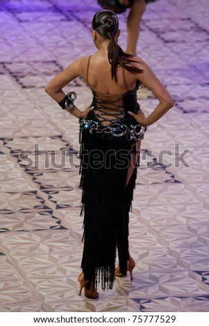 BUCHAREST - APRIL 17: Unknown latin dancer, competes at IDSF (International Dance Sport Federation) Dance Masters on April 17, 2011 in Bucharest, Romania