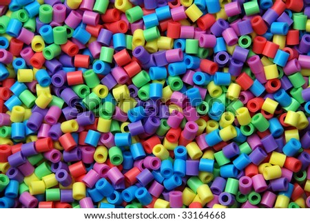 Group of plastic beads of many colors