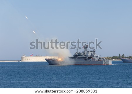 SEVASTOPOL RUSSIA - JULY 28: artillery salute in the honor of the Day of the Navy on july 28, 2014 in Sevastopol, Crimea, Russia.